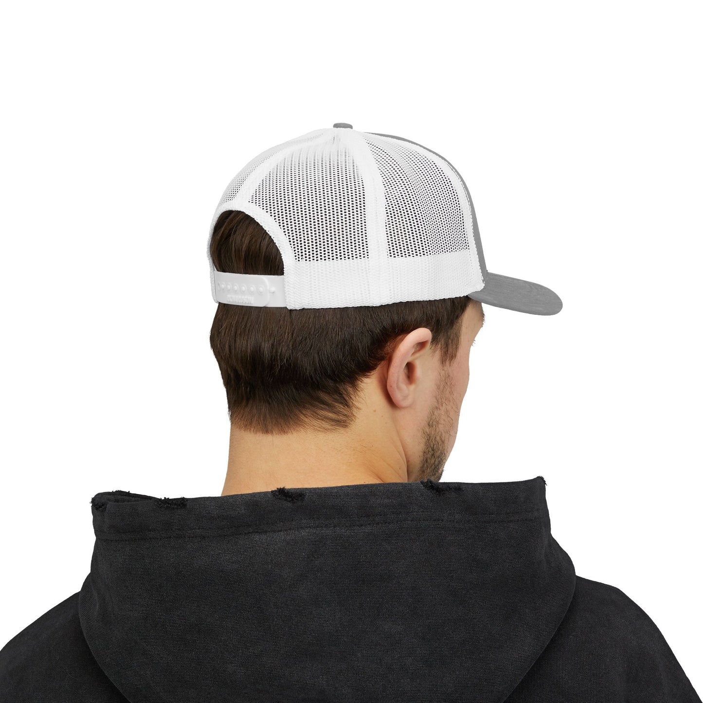 Back view of America 250th anniversary cap worn by a man in a gray hoodie, showcasing the trucker cap's mesh design.