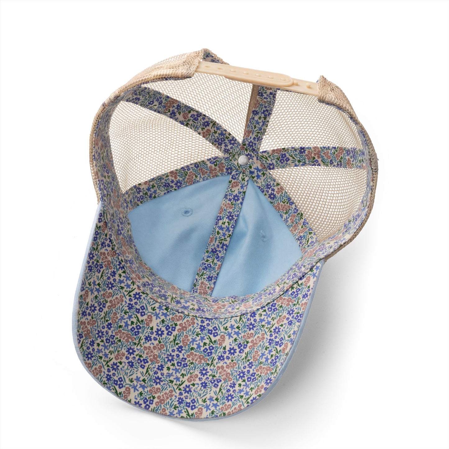 Minnetonka women's cap featuring a floral pattern and washed mesh-back design, perfect for casual outings.