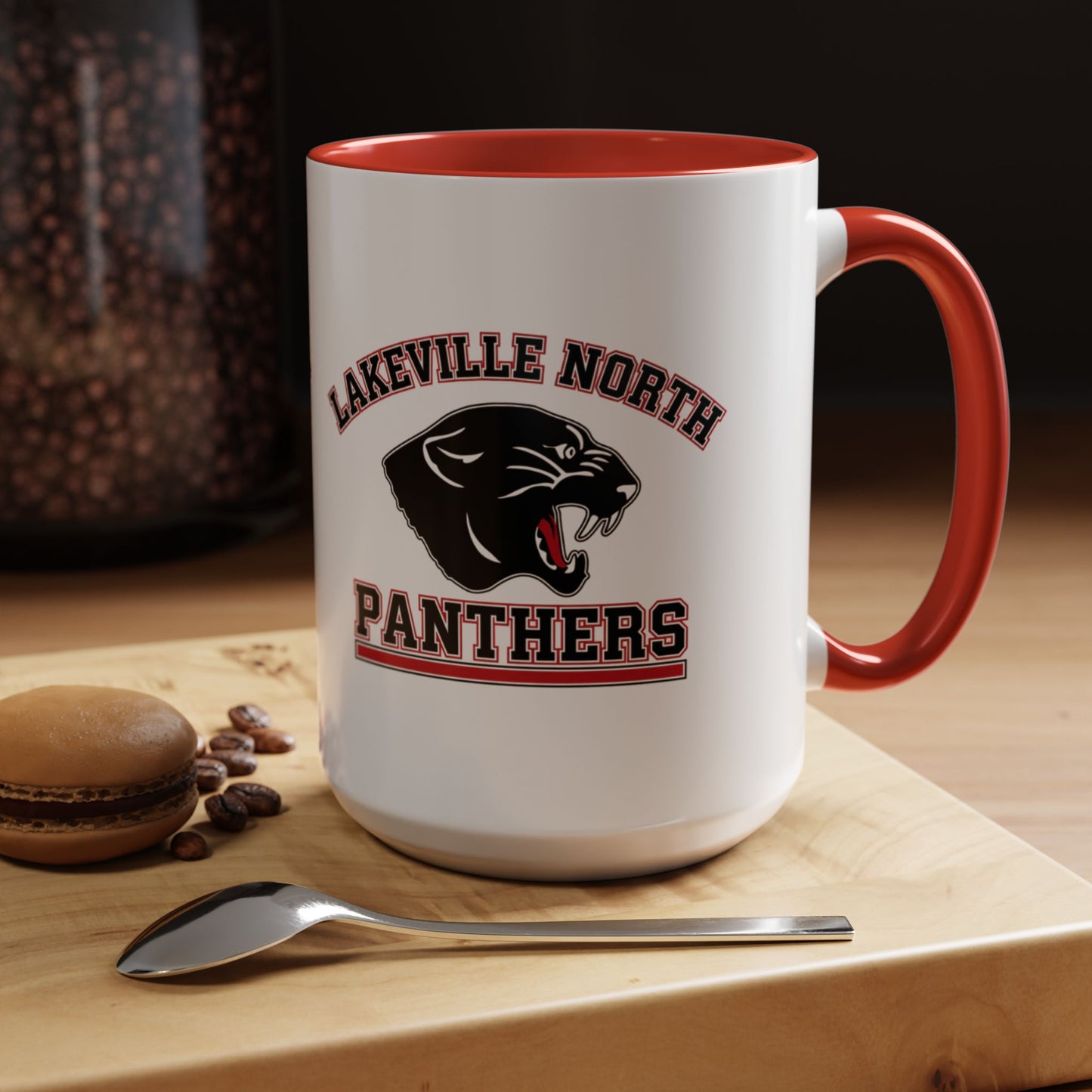 Lakeville North Panthers coffee mug featuring a red interior, perfect for morning coffee and cozy evenings.