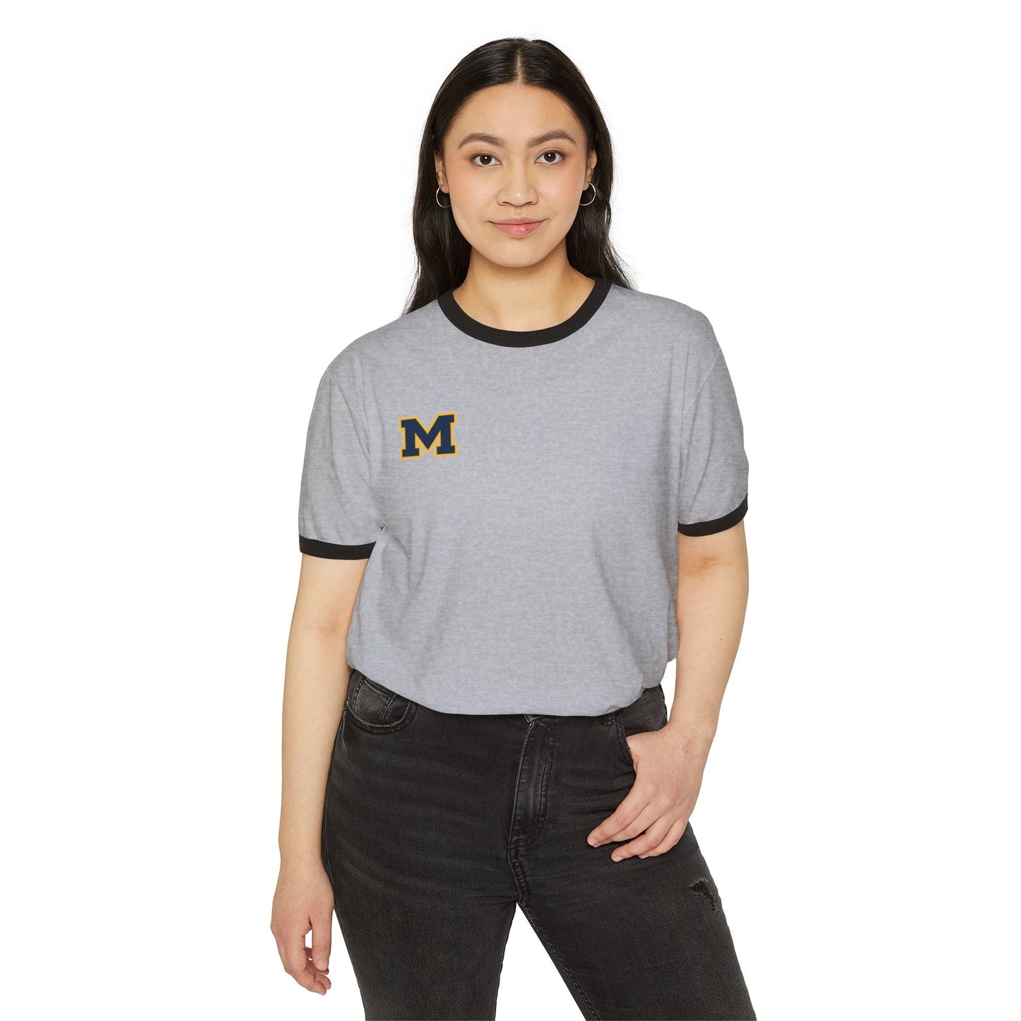 Woman wearing a soft Mahtomedi Zephyrs vintage collegiate ringer tee with an emblem on the chest.
