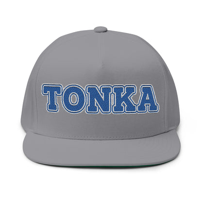 Minnetonka flat bill cap with embroidered TONKA text on a gray background, perfect for showcasing local pride.