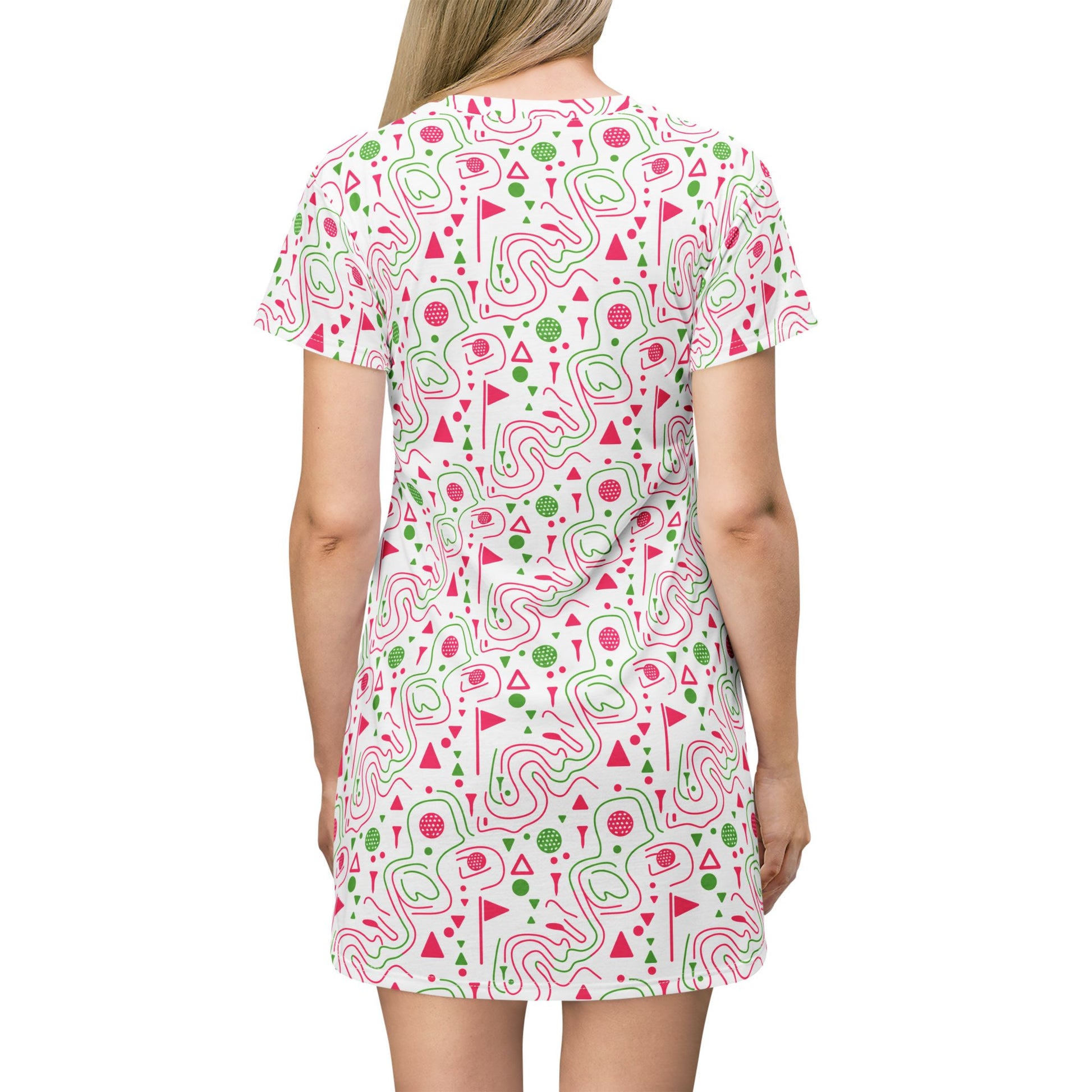 Back view of Logger's Trail golf t-shirt dress for summer featuring a vivid flamingo-and-trees print.