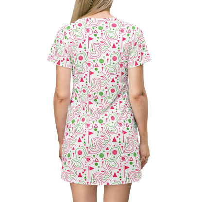 Back view of Logger's Trail golf t-shirt dress for summer featuring a vivid flamingo-and-trees print.